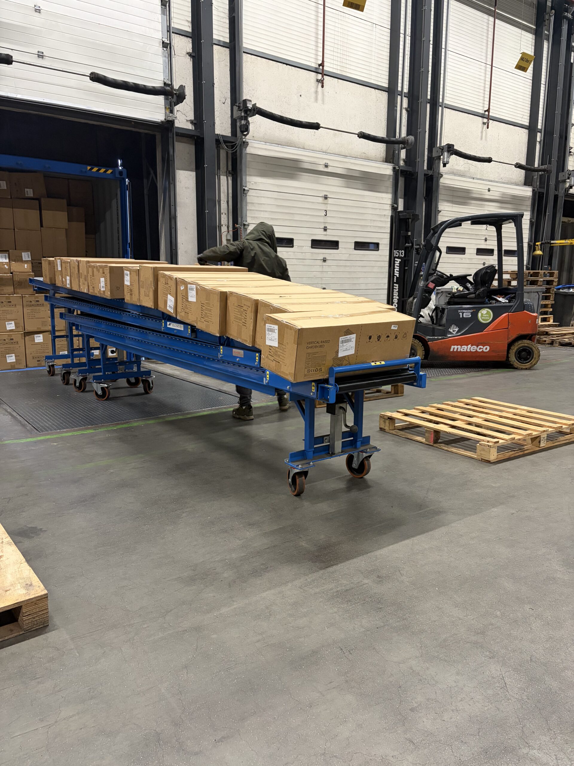 Rolling track with boxes on top of it